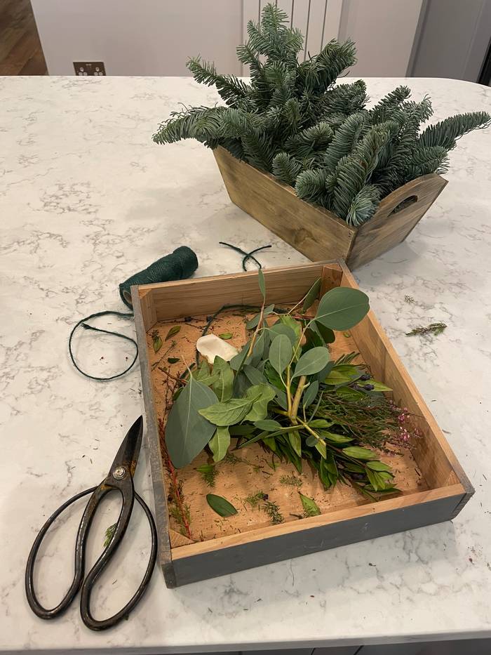 Collect greenery for the body of your wreath