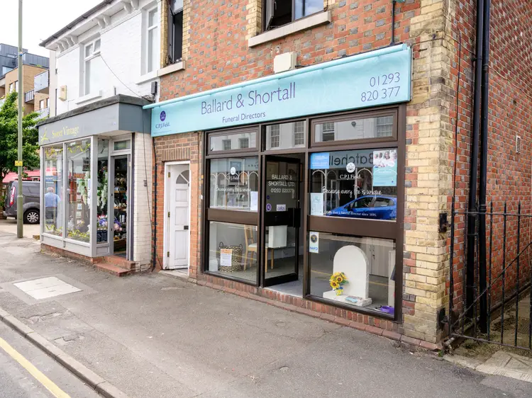 A photo showing the CPJ Field Ballard & Shortall funeral home in Horley.