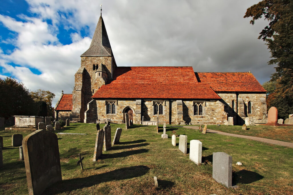 A photo showing a church in the rural village of Burwash.