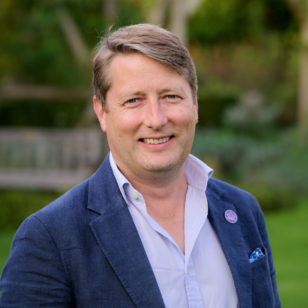 Headshot of Charlie Field, Co-CEO of CPJ Field & Co.