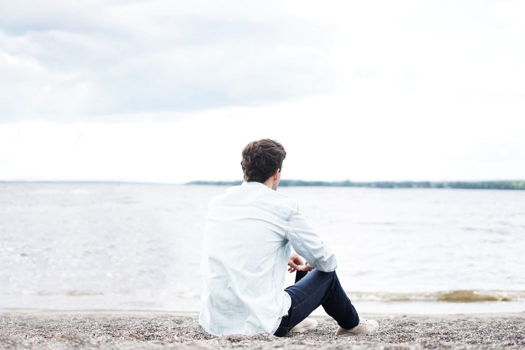 Man looking out at sea